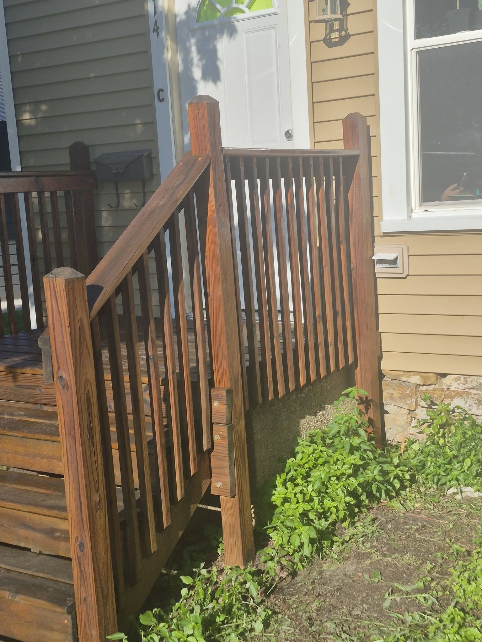 Deck and railing rebuild, sanded and stained, Tomah WI